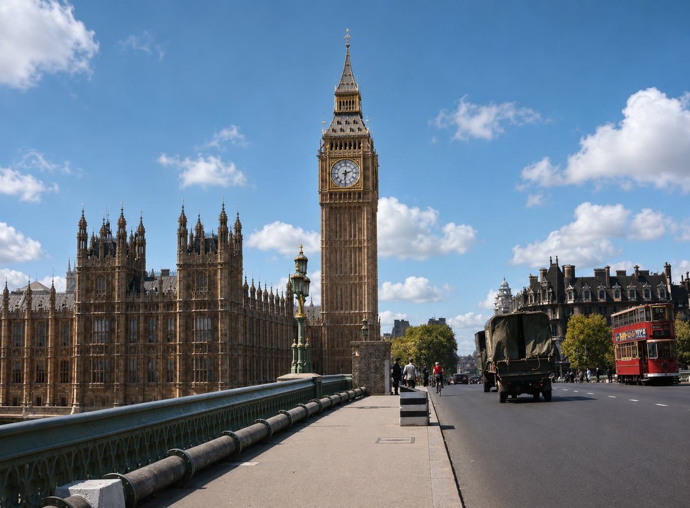 The Palace of Westminster and Big Ben viewed from Westminster Bridge, with traffic crossing the river. Colourised period photograph.