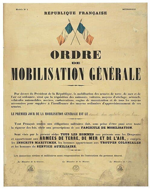 Printed French Republic poster titled 'Ordre de Mobilisation Générale', dated 1 September 1939, declaring that the first day of general mobilisation will be Saturday 2 September. Two crossed tricolour flags appear above the text. Colourised archival document.